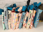 Pochette à livre / liseuse / tablette / iPad avec gros nœud - Petit modèle Les Mimines d'Amélie